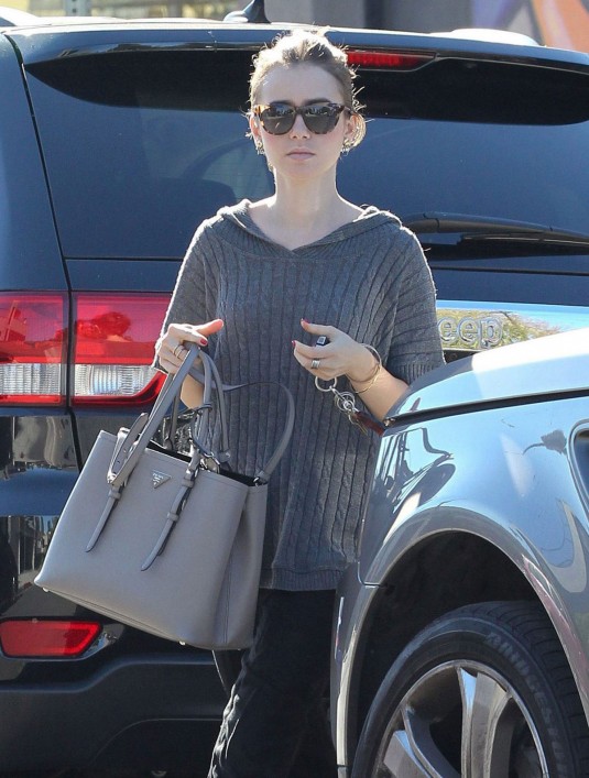 LILY COLLINS Out in West Hollywood