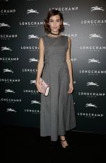 ALEXA CHUNG at Longchamp Elysees Light On Party Photocall in Paris