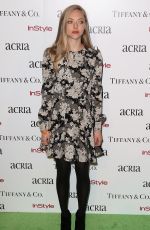 AMANDA SEYFRIED at 2014 Acria Holiday Dinner in New York