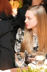 AMANDA SEYFRIED at 2014 Acria Holiday Dinner in New York