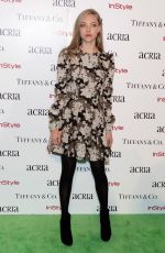 AMANDA SEYFRIED at 2014 Acria Holiday Dinner in New York
