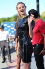 BEHATI PRINSLOO on the Set of Extra at Universal Studios in Hollywood