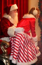 BELLA THORNE as Santa