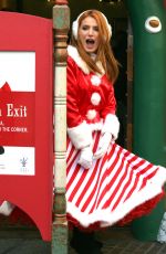 BELLA THORNE as Santa