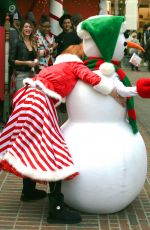BELLA THORNE as Santa
