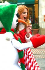 BELLA THORNE as Santa
