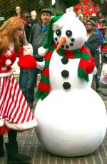 BELLA THORNE as Santa