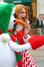BELLA THORNE as Santa