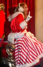 BELLA THORNE as Santa