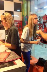 CARA DELEVINGNE at Tattoo Parlor in Brazil