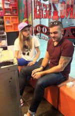 CARA DELEVINGNE at Tattoo Parlor in Brazil