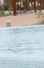 CHLOE SIMS in Bikini at a Pool in Cape Verde