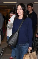 COURTNEY COX Arrives at LAX Airport in Los Angeles 1712