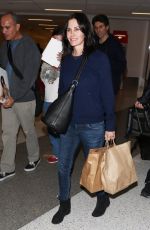 COURTNEY COX Arrives at LAX Airport in Los Angeles 1712