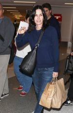 COURTNEY COX Arrives at LAX Airport in Los Angeles 1712