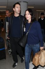 COURTNEY COX Arrives at LAX Airport in Los Angeles 1712
