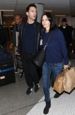 COURTNEY COX Arrives at LAX Airport in Los Angeles 1712
