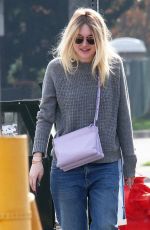 DAKOTA FANNIG Walks Her Dog Out in Los Angeles