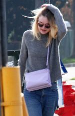 DAKOTA FANNIG Walks Her Dog Out in Los Angeles