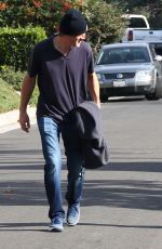 DAKOTA FANNIG Walks Her Dog Out in Los Angeles