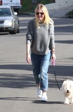 DAKOTA FANNIG Walks Her Dog Out in Los Angeles