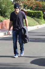 DAKOTA FANNIG Walks Her Dog Out in Los Angeles