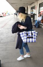 DAKOTA FANNING Leaves LAX Airport in Los Angeles 1912