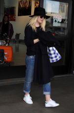 DAKOTA FANNING Leaves LAX Airport in Los Angeles 1912