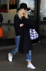 DAKOTA FANNING Leaves LAX Airport in Los Angeles 1912