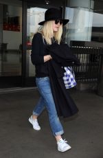 DAKOTA FANNING Leaves LAX Airport in Los Angeles 1912
