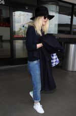 DAKOTA FANNING Leaves LAX Airport in Los Angeles 1912