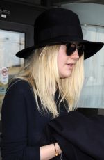 DAKOTA FANNING Leaves LAX Airport in Los Angeles 1912