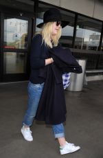 DAKOTA FANNING Leaves LAX Airport in Los Angeles 1912