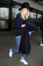 DAKOTA FANNING Leaves LAX Airport in Los Angeles 1912