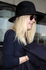 DAKOTA FANNING Leaves LAX Airport in Los Angeles 1912