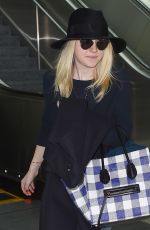 DAKOTA FANNING Leaves LAX Airport in Los Angeles 1912
