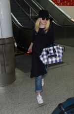 DAKOTA FANNING Leaves LAX Airport in Los Angeles 1912