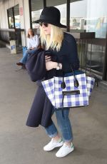 DAKOTA FANNING Leaves LAX Airport in Los Angeles 1912