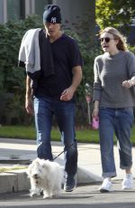 DAKOTA FANNING Out Walks Her Dog in Los Angeles
