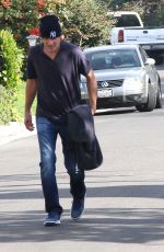 DAKOTA FANNING Out Walks Her Dog in Los Angeles