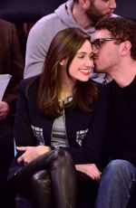 EMMY ROSSUM and Sam Esmail at Knicks vs Mavericks Game in New York