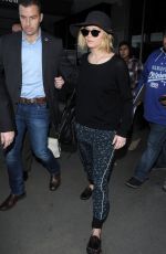 JENNIFER LAWRENCE Arrives at Los Angeles Inernational Airport 1812