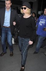 JENNIFER LAWRENCE Arrives at Los Angeles Inernational Airport 1812