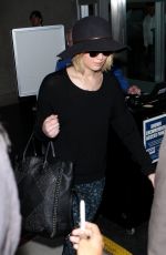 JENNIFER LAWRENCE Arrives at Los Angeles Inernational Airport 1812
