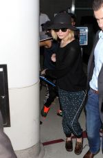 JENNIFER LAWRENCE Arrives at Los Angeles Inernational Airport 1812