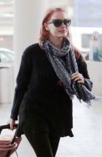 JESSICA CHASTAIN Arrives at Los Angeles International Airport 0212
