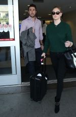 KATE UPTON Arrives at LAX Airport in Los Angeles 1712