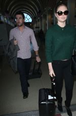 KATE UPTON Arrives at LAX Airport in Los Angeles 1712