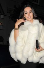 KELLY BROOK Arrives at a Christmas Party