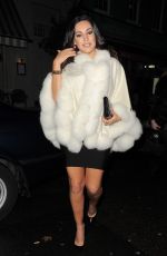 KELLY BROOK Arrives at a Christmas Party